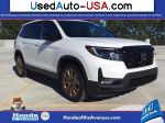 Honda Passport AWD Elite  used cars market